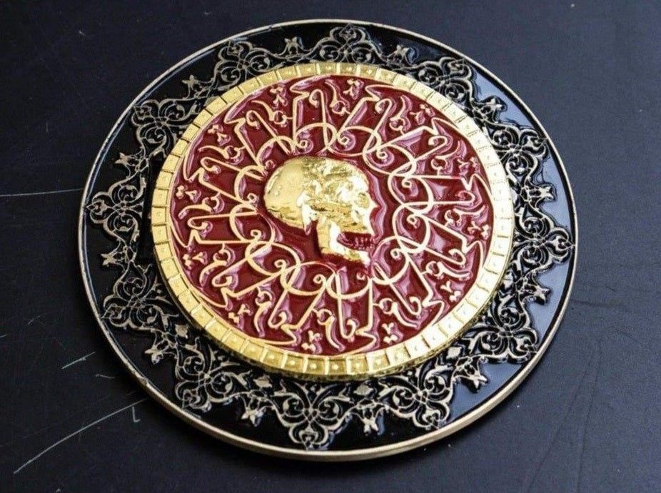 Arabic Blood oath marker Sofia John. Morocco Continental Hotel Gold coin. John